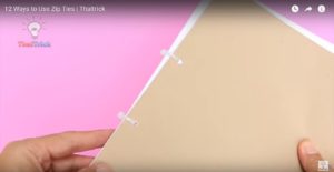 sử dụng dây rút nhựa cố định vở, sách